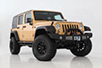 lifted JK Wrangler 2014 Dune color with Atlas bumpers from DSI