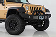 lifted JK Wrangler 2014 Dune color with Atlas bumpers from DSI